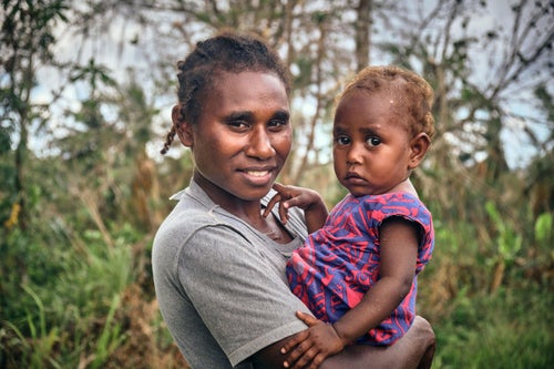 Mother and daughter after the cyclones hit Vanuatu in 2023