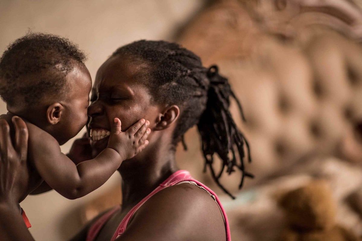 Nonhlanhla Dubazane with her son Answer in Mphumaleagna, South Africa, in 2013. 