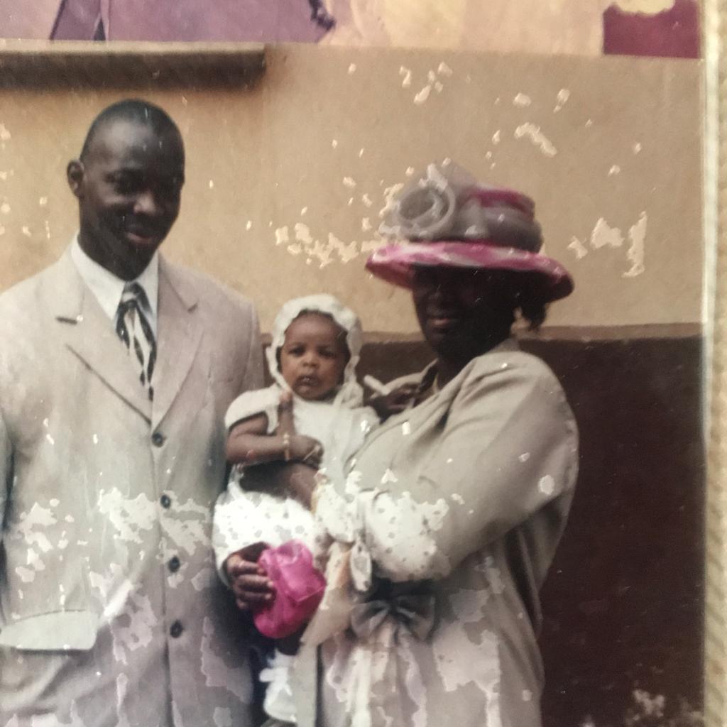 A young Princess with her mum and dad.