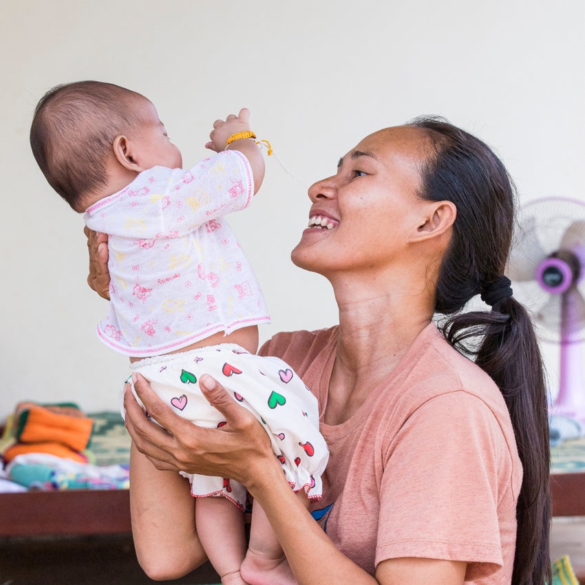 A pregnant mother waiting at a healthcare centre in Lao PDR