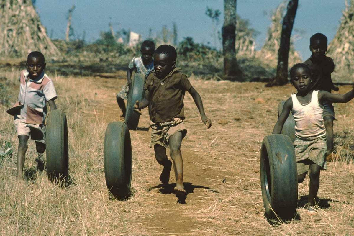 Children play with tyres in Zimbabwe in 1988. The Organisation of African Unity had just signaled its hopes for the future by declaring 16 June to be the Day of the African Child