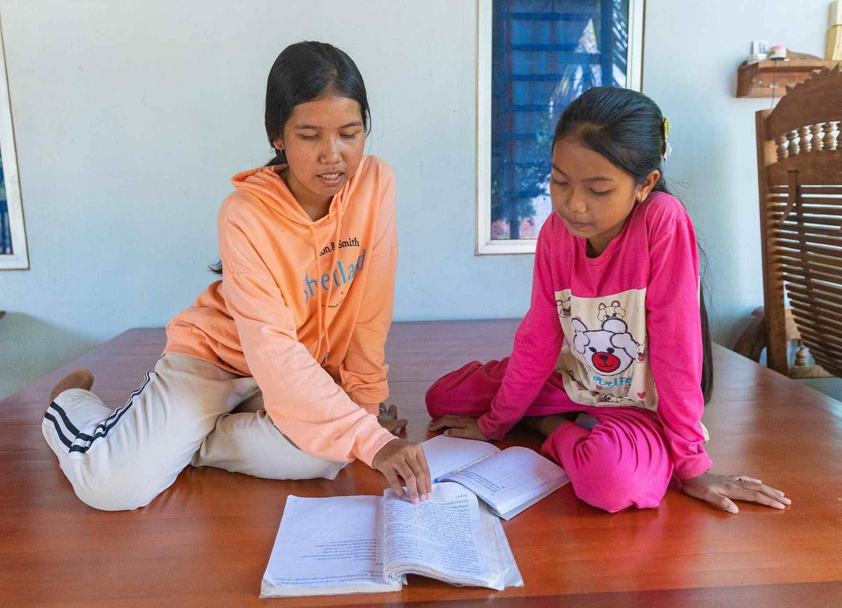 A local girl draws on her soft skills to support her little sister with her math homework so she doesn’t fall behind while schools are closed and students are engaging in distance learning from home. 