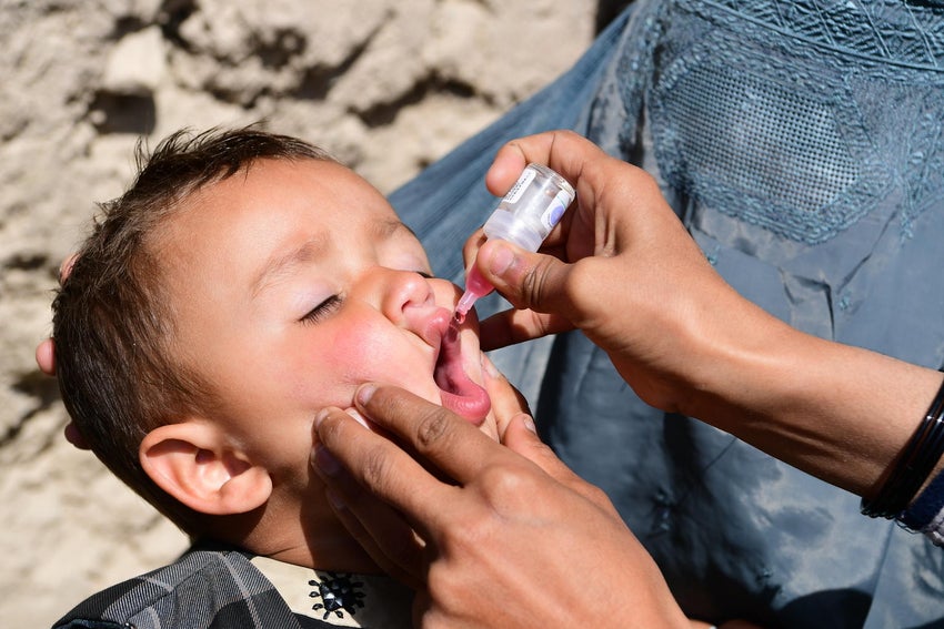 An Afghanistan boy getting vaccinated