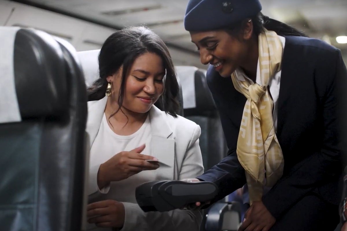 Women on flight donating to UNICEF 