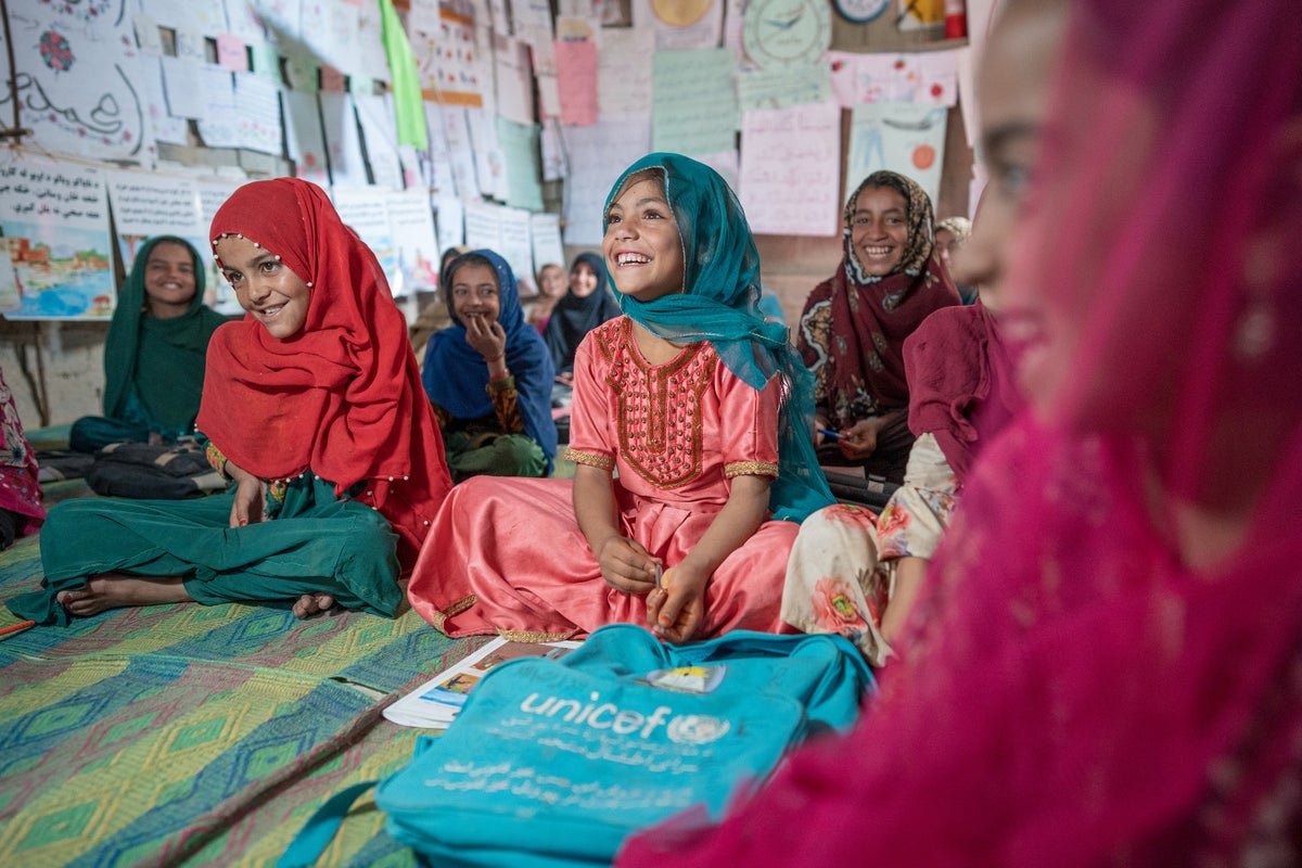 A child sits in class in a UNICEF-supported community school.