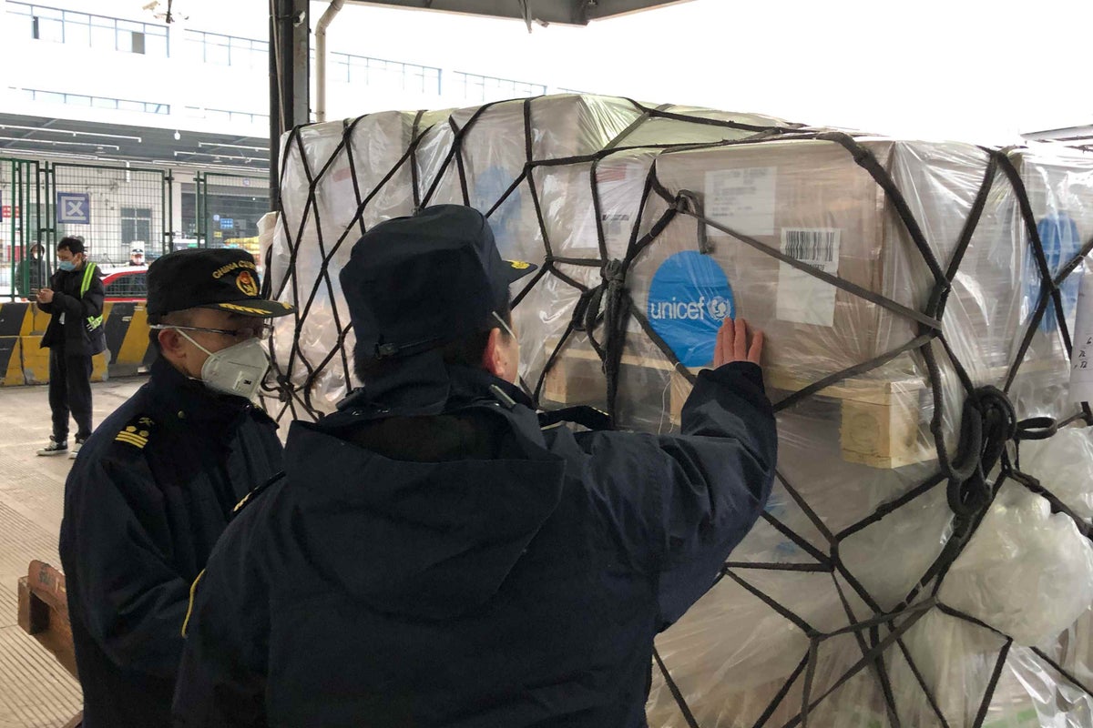 A shipment of UNICEF boxes of protective equipment, including protective suits, surgical masks and respiratory masks arrives in Shanghai, China on 29 January 2020. 