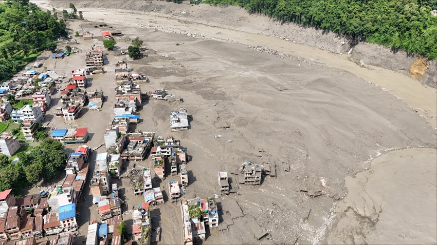 Views of settlements in central northern Nepal covered in mud following the devastating flash floods.
