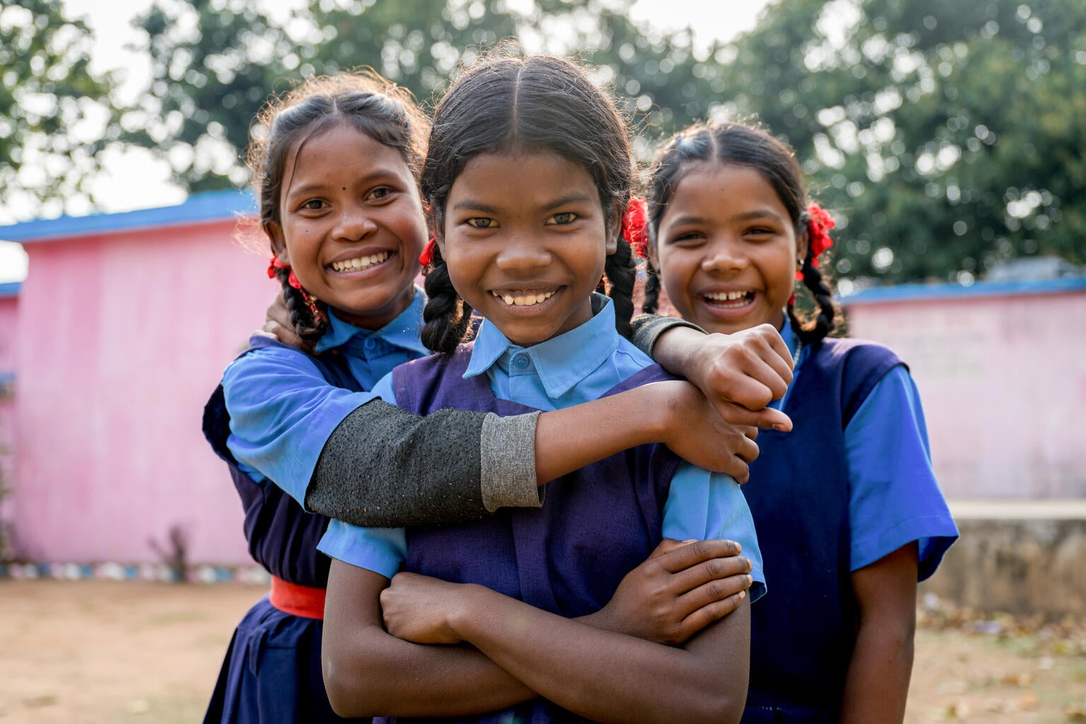 Child playing in the trees