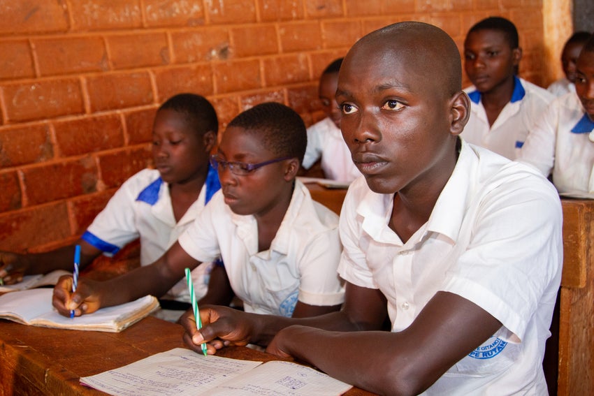 Year 8 students in Burundi build a rocket stove 