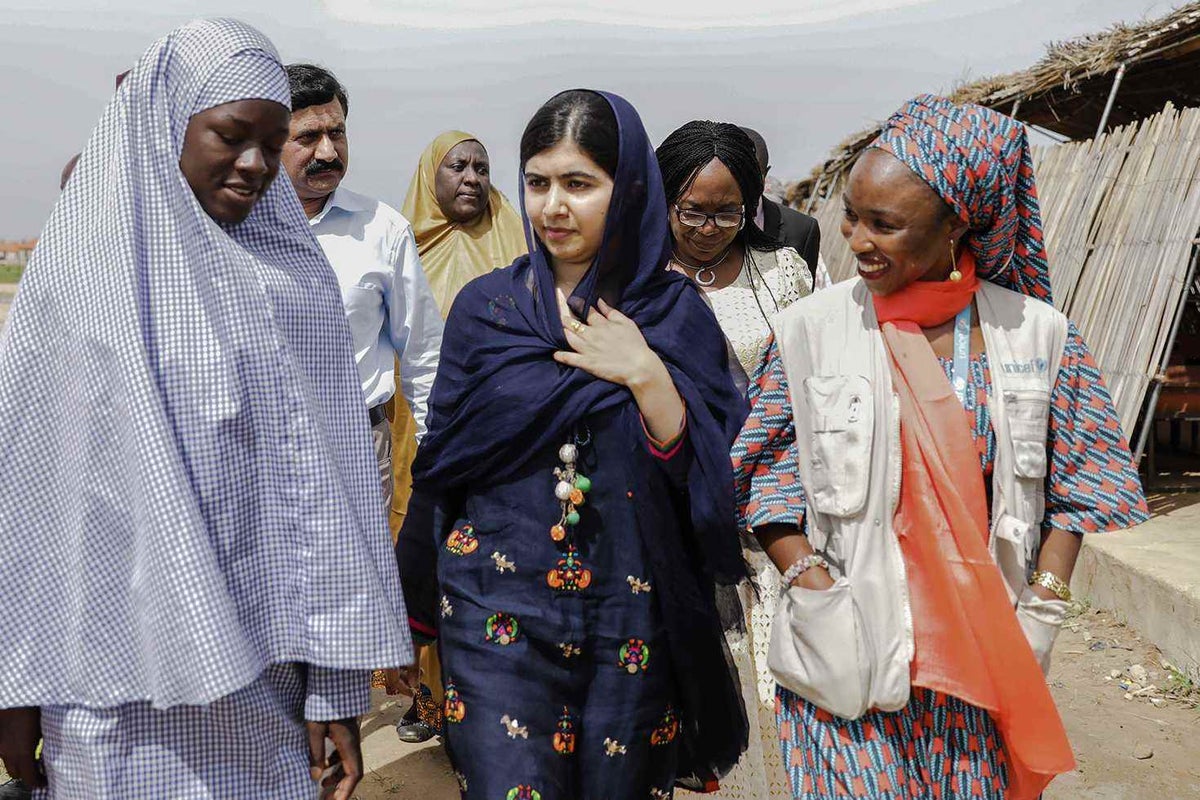 Malala and a group of women