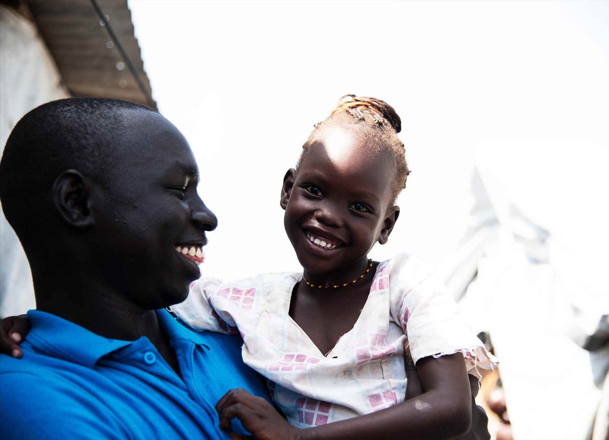 UNICEF Caseworker Simon helps children like little Nyajiper reunite with their parents and loved ones. 