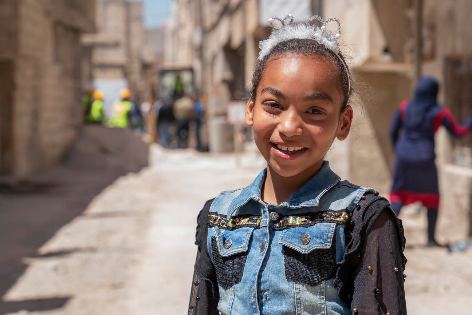 Salam, 10, in her neighborhood where a sewage rehabilitation project supported by UNICEF is underway in Shabaa, Rural Damascus, Syria