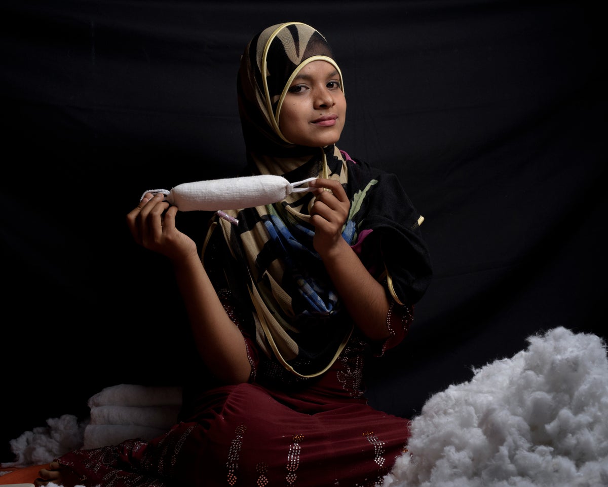 Girl holds sanitary towel