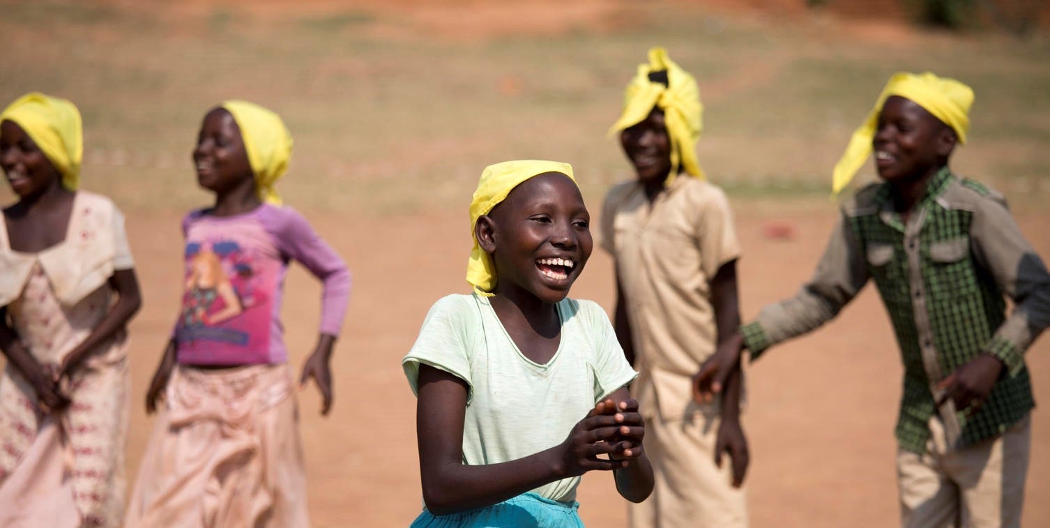 Burundi teenagers singing and dancing together