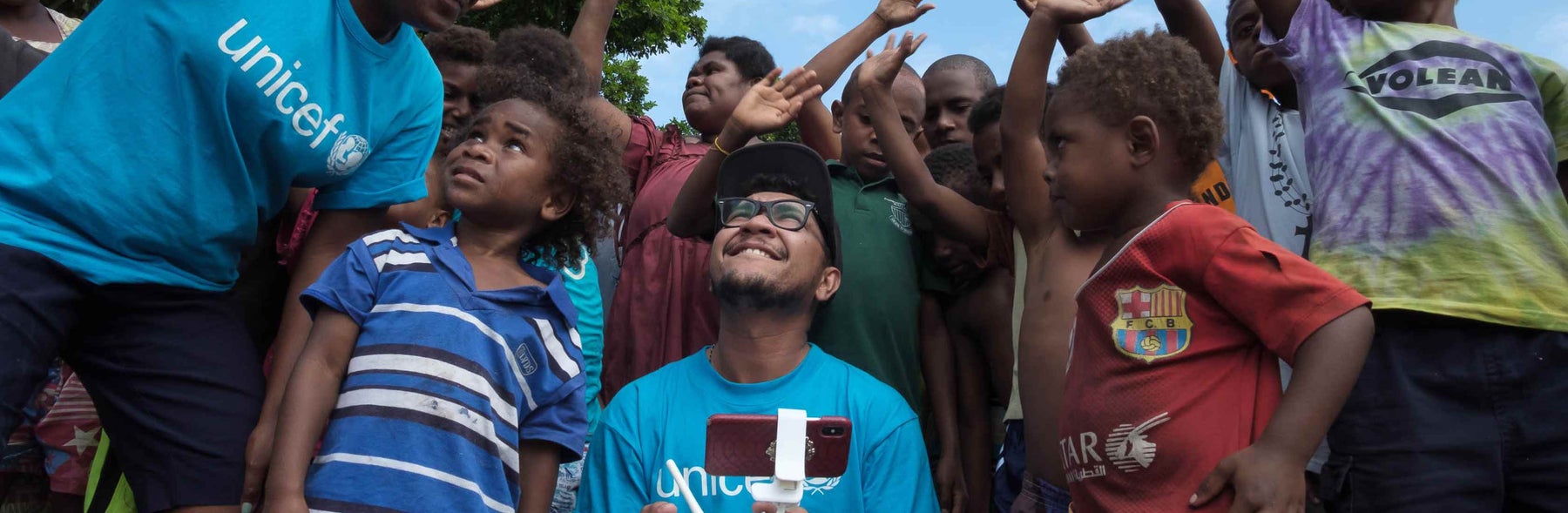 UNICEF staff introducing children in Vanuatu to the magic of drones