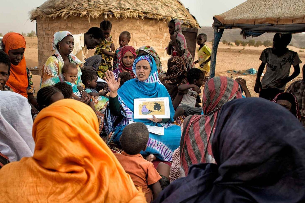 Women attend FGM/C awareness rising session. 