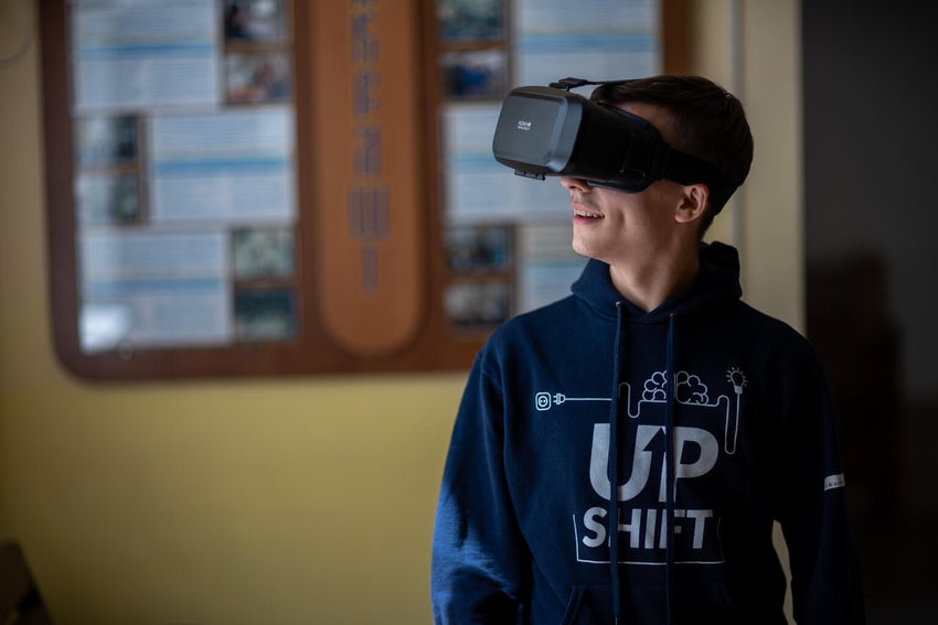 Young boy from Ukraine using virtual reality technology.