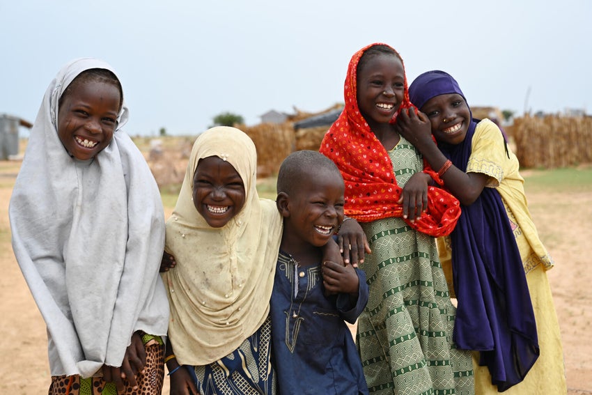 Young children from Niger smiling at the camera