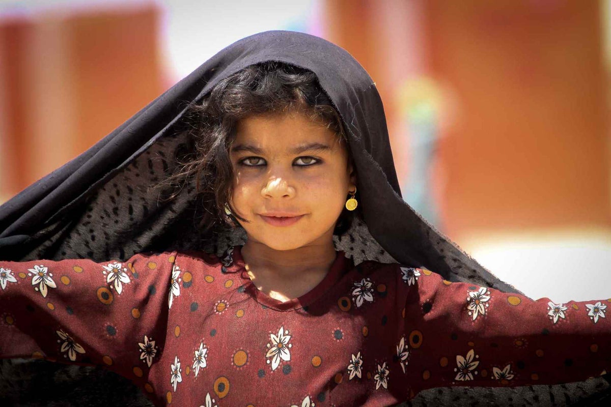 Child looking at camera posing.