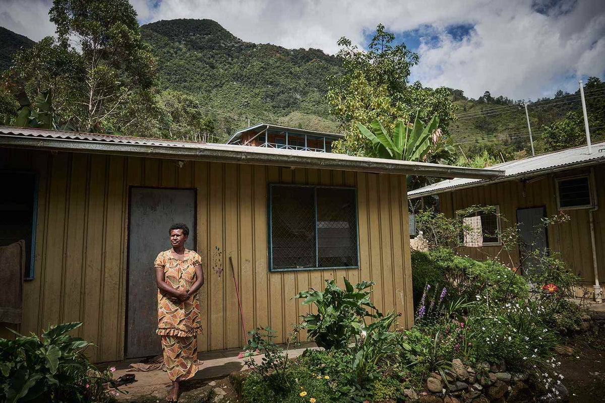 Wasna outside her home in the mountain village of Goglme, Chimbu