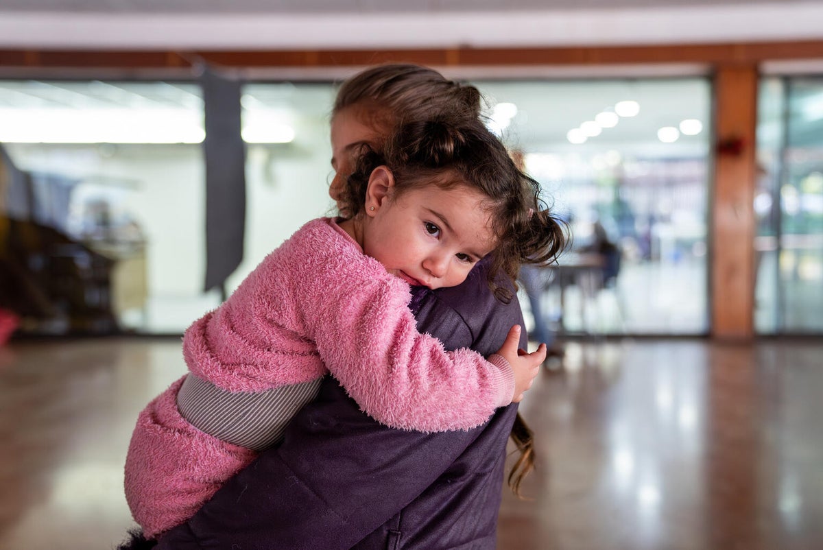 Sisters stand in a public school being used as a shelter, after escalating violence forced families from southern Lebanon and Beirut’s southern suburbs to leave their homes.