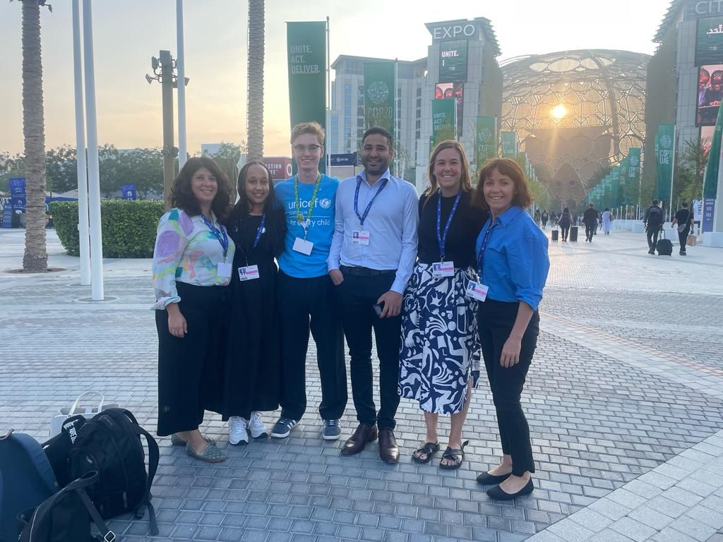 UNICEF Australia delegates standing outside COP28 in Dubai, United Arab Emirates