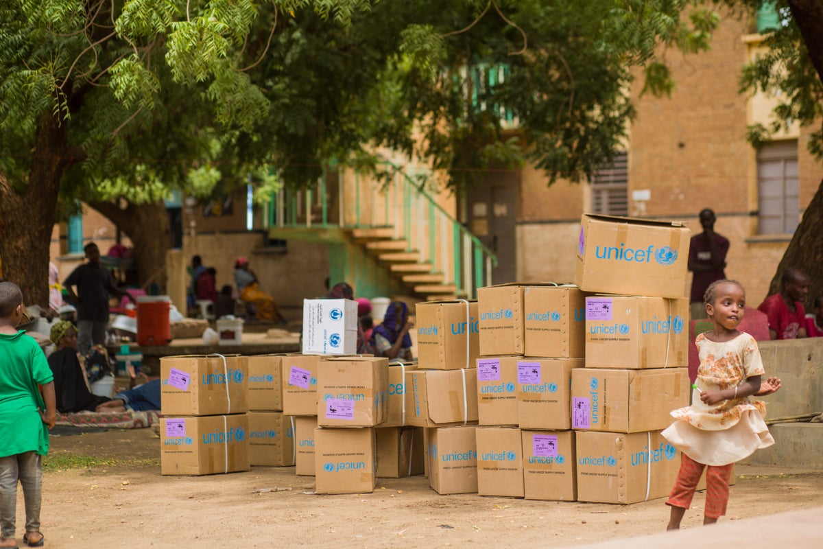 Boxes of UNICEF supplies at a gathering point in Sudan, hosting displaced children and families