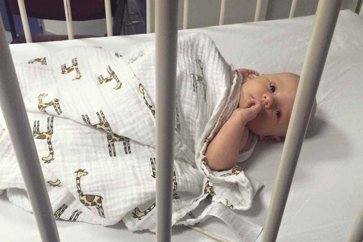 Riley peeking at us from his hospital bed. He didn't even seem that sick when he was first admitted. He wasn't needing oxygen or anything. It all went downhill so quickly.