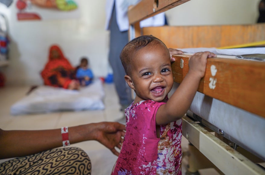 Obsinale, one year old, is recovering from malnutrition in Somalia. She came here with her twin sister who just got discharged after fully recovering.