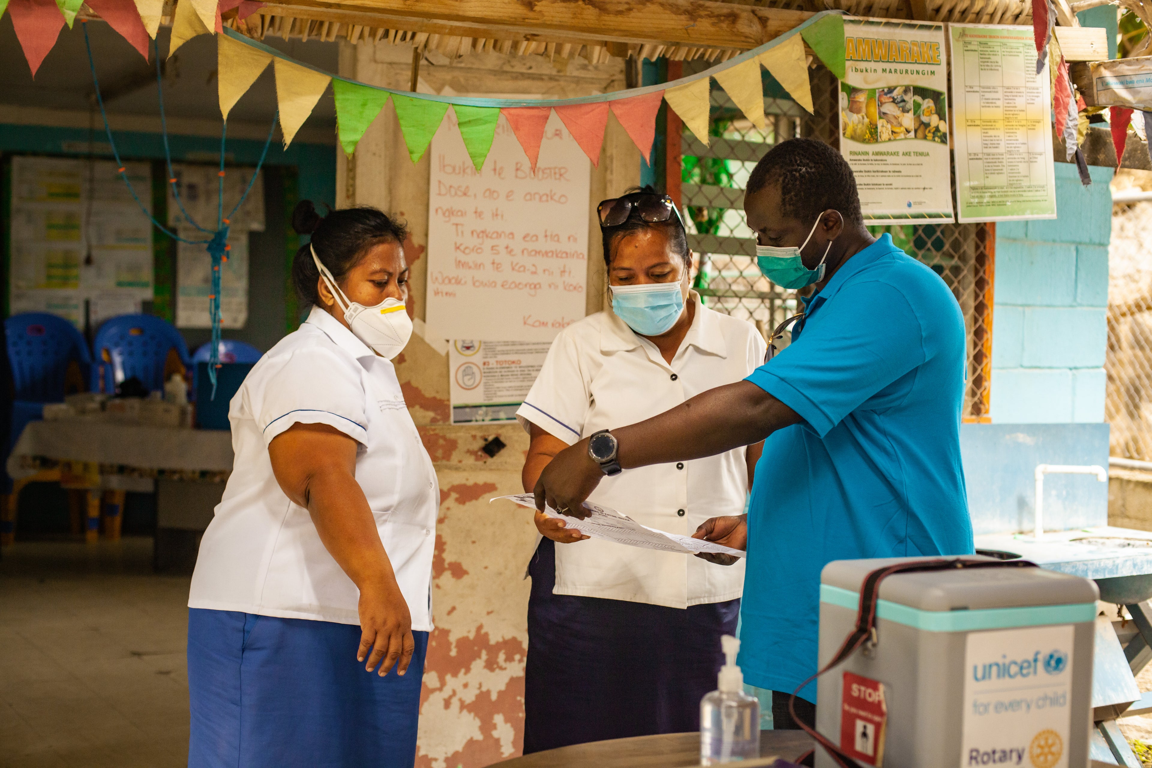 Ibrahim with health workers in Kiribati