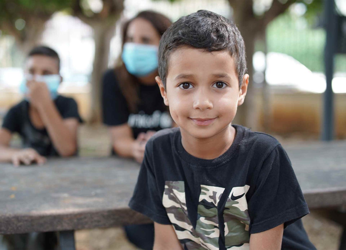 Omar, 7, participates in psychosocial support activities at UNICEF's child-friendly space in Beirut, Lebanon