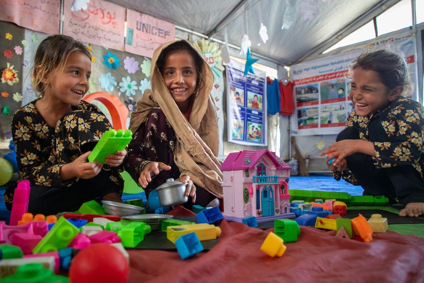 Schoolgirls playing at a child friendly space in Afghanistan.
