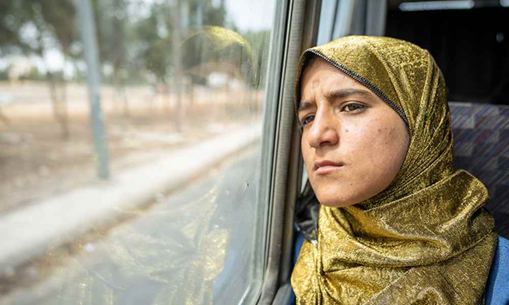 Madelin was able to return to school thanks to UNICEF-supported transportation. 