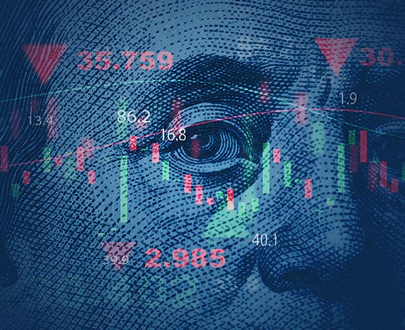 Close-up of Benjamin Franklin’s face from U.S. $100 bill overlaid with red candlestick charts, downward arrows, and financial data, symbolizing economic trends and projections for the year ahead.