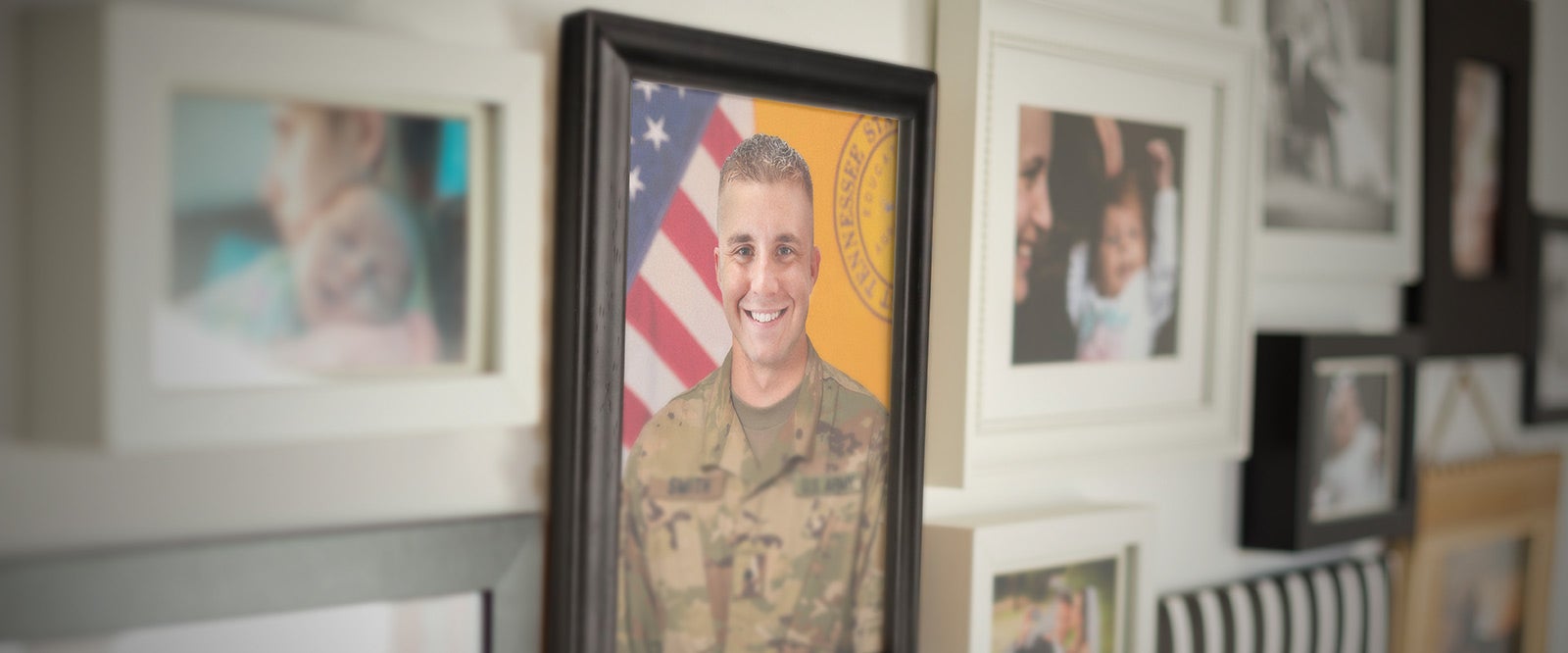 Photos of the wall of a parent of a military member.