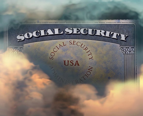 A social security card sitting in a mist of clouds and fog.