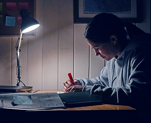 Woman studying at her desk