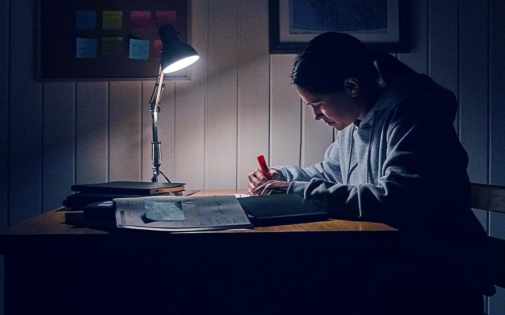 Woman studying at her desk