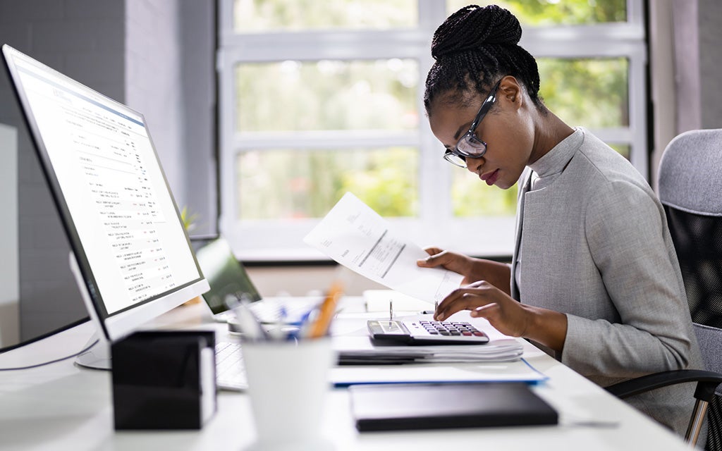 Military woman working on financial plan