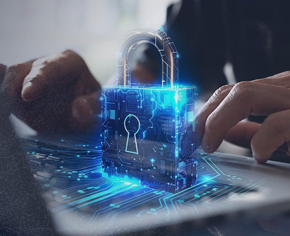 Lock on top of a laptop symbolizing privacy and security