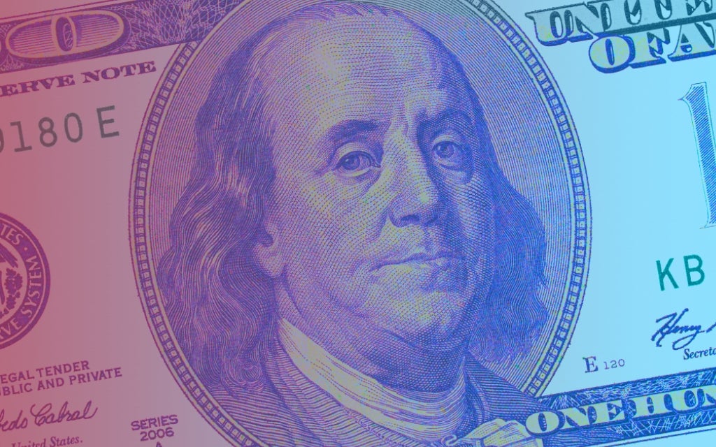 Image of 100 dollar bill with red and blue overlay, focused on Benjamin Franklin.