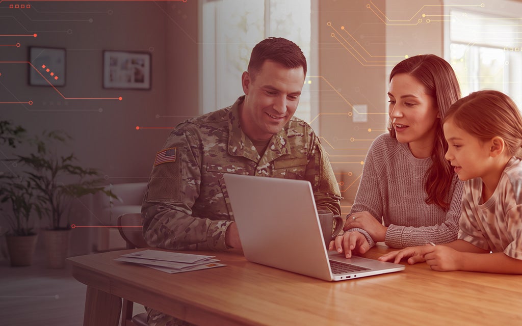 Military family using a laptop with cybersecurity graphics, highlighting online security and cyber awareness best practices.