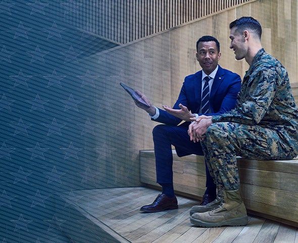 A financial advisor meeting with a service member.