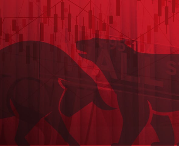 Image of a bull and bear on a red background.