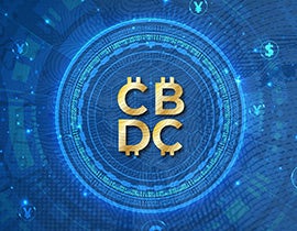 CBDC in gold letters with a blue digital circle background over the us dollar