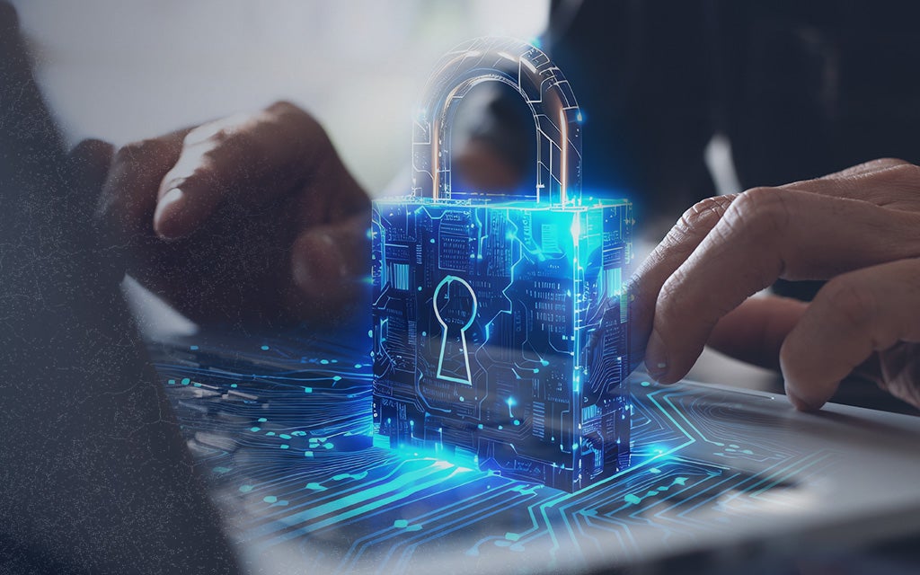 Lock on top of a laptop symbolizing privacy and security