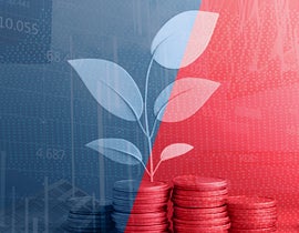 A stack of red coins in the foreground with a white plant sprouting upward, set against a split blue-and-red background featuring faint financial charts and stock market data