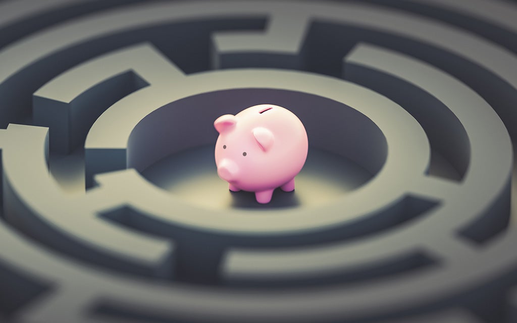 Image of piggy bank in center of a maze