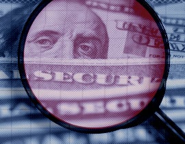 magnifying glass on US dollar bill and social security cards