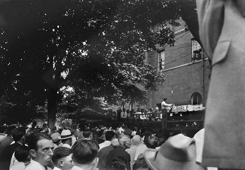 A view of the outdoor proceedings at the Scopes trial, July 20,1925, before the “Read your Bible” sign was removed (photo by William Silverman, now in the Smithsonian Institution archives, here via Wikimedia commons)